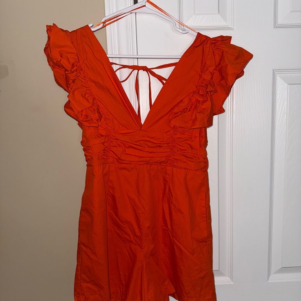 Vibrant Orange Ruffled Romper